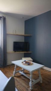 Appartements Chez Audrey & Fabien - Appartement avec terrasse : photos des chambres