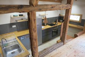 Appartements Le Grenier 1746 : photos des chambres