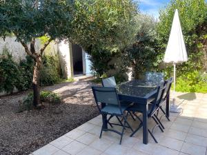 Maisons de vacances Maison lumineuse, de plain-pied, avec jardin clos - A 5mn de la plage : photos des chambres
