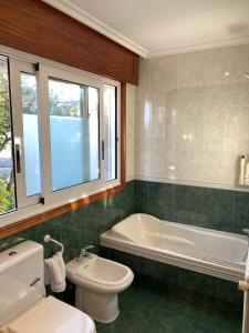 Chalet adosado independiente en Vigo - Canido