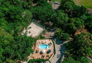 Chalé com 2 Suítes Piscina e Quadra de Vôlei