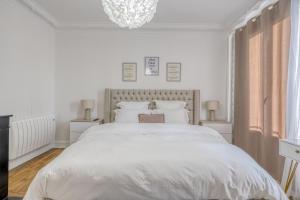 Villas ZACH & SPA - Maison jardin a 20 min de Paris & Aeroport CDG : photos des chambres