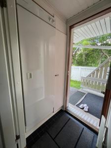 Pronssi Villa, Vuokatin ytimessä sisältyy Ilmainen pysäköinti, Sauna, etu terassi ja piha alue, Wi-Fi, SmartTV