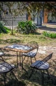 Minicasas cerca del rio Los Reartes