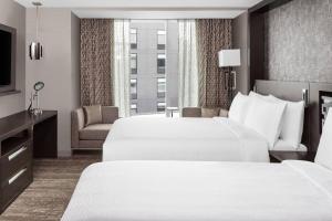 Queen Room with Two Queen Bed, Courtyard view room in Envue Autograph Collection