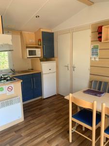 Villages vacances Camping les Fouguieres : photos des chambres
