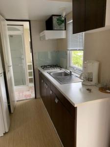 Villages vacances Camping les Fouguieres : photos des chambres