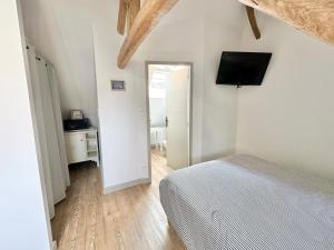 Appartements Maison - 2 chambres - Terrasse - Babyfoot : photos des chambres
