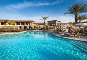 Escape the heat of Palm Desert inthe 3 pools with waterslide at this great resort 2BD condo