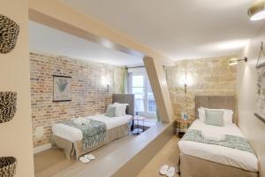 Appartements Sweett - Sentier : photos des chambres
