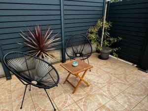Appartements Au calme dans maison en rez de jardin a 2,2 kms du Groupama stadium et salle LDLC Arena : photos des chambres