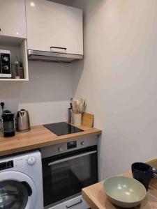 Appartements Charmant Studio au coeur de la ville : photos des chambres