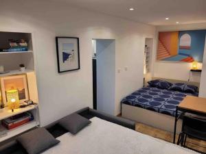 Appartements Charmant Studio au coeur de la ville : photos des chambres