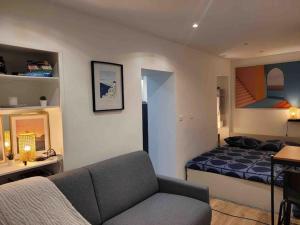 Appartements Charmant Studio au coeur de la ville : photos des chambres