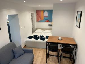 Appartements Charmant Studio au coeur de la ville : photos des chambres