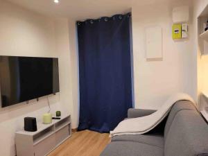 Appartements Charmant Studio au coeur de la ville : photos des chambres