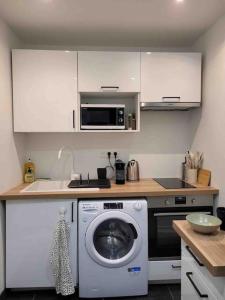 Appartements Charmant Studio au coeur de la ville : photos des chambres