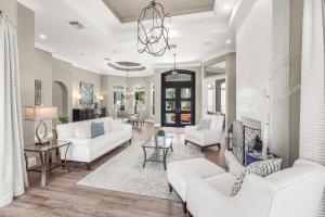 Opulent golf front home with SW-facing lanai and pool