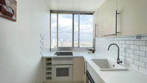 102 - 27ème étage avec Vue Panoramique sur Paris - 4 personnes