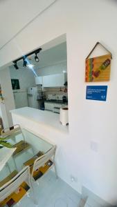 Apartamento com varanda Gourmet na praia da enseada