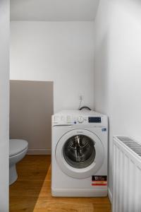 Appartements Le Celestin - Appartement 2 chambres avec jardin en centre ville : photos des chambres