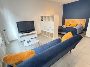 Appartements La Fontaine Wifi Parking Un Sejour a Part : photos des chambres