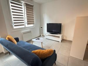 Appartements La Fontaine Wifi Parking Un Sejour a Part : photos des chambres