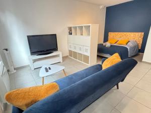 Appartements La Fontaine Wifi Parking Un Sejour a Part : photos des chambres