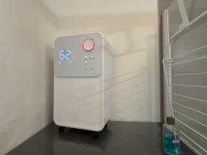 Appartements La Fontaine Wifi Parking Un Sejour a Part : photos des chambres