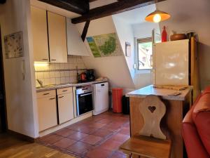 Appartements Les Toits du Tonnelier - 64 m2 - situation plein centre medieval - sauna - 2 garages : photos des chambres