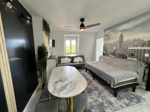 Appartements Disneyland et PARIS F2 a Thorigny tout Confort : photos des chambres