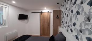 Appartements Les Olivettes - Appartement calme au coeur d-Anduze : photos des chambres