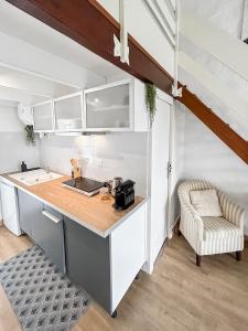 Appartements Douceur de vivre, calme et jardin Appartement 3 : photos des chambres