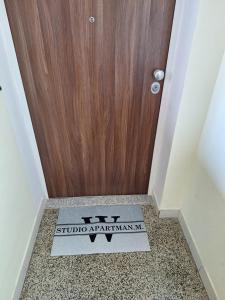 STUDIO APARTMAN MARKo C self-check in,frre parking