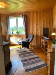 Lapplands lilla Gästhuset med båtuthyrning - Lapplands kleines Gästehaus mit Bootsverleih