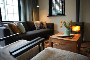 De Appelbloesem 6-persoons met overdekte hottub, barrelsauna, lounge, wifi