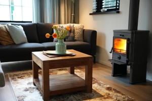 De Appelbloesem 6-persoons met overdekte hottub, barrelsauna, lounge, wifi