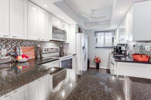 Condo with Patio and Resort Amenities in Fort Pierce!