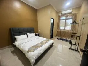 Cosmos Homestay - Kampong Simpang Empat