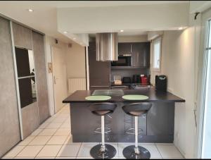 Appartements Charming studio near from CDG airport : photos des chambres