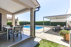 Holiday House Gortan for 7 people near Pula with children playground and private pool - pet friendly