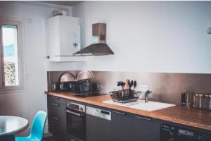 Appartements Le Lotus - avec place de parking : photos des chambres