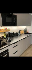 Appartements Le moderne boise Disneyland Paris 10 min - Parking : photos des chambres