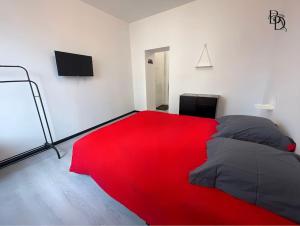 Appartements T1 Bis A3 30m2 Cosy 7min a pieds Gares appartement : photos des chambres