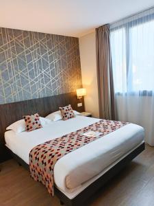Hotels Brit Hotel Ploermel - Hotel de l'Hippodrome : photos des chambres