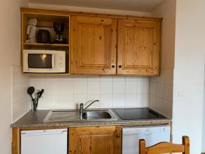Appartements travelski home classic - Les Chalets de la Fontaine du Roi : photos des chambres