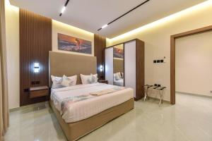 شقق وغرف امار للشقق المخدومة حي الملقا فئة التصنيف اقتصادي