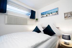 FeWo Traumblick - Küstenklang erste Reihe mit TRAUM Meerblick aus dem Bett