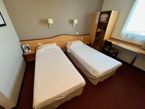 Hotels Brit Hotel Confort Montauban : Chambre Lits Jumeaux Standard