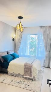 Elegant Lavington 1Bed with Pool, Private Cinema & Garden